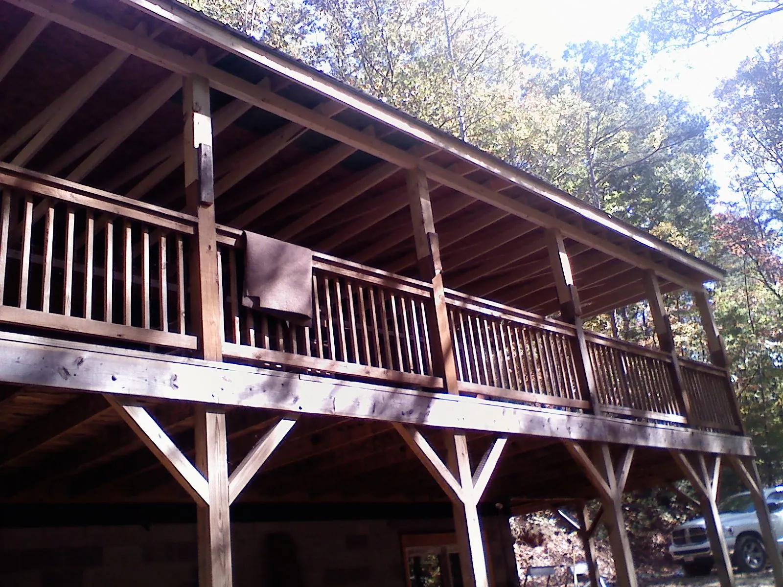 Timber framing under a new elevated porch and deck — Roof Leak Repair in Young America by Roofing Brothers